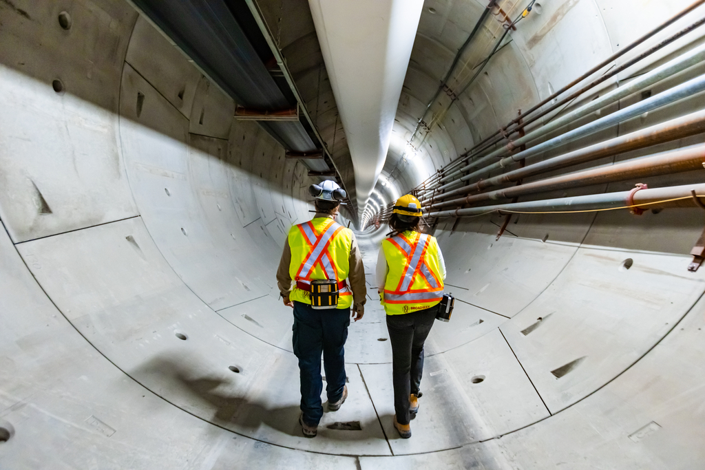 Image of two people on a tunnel.
