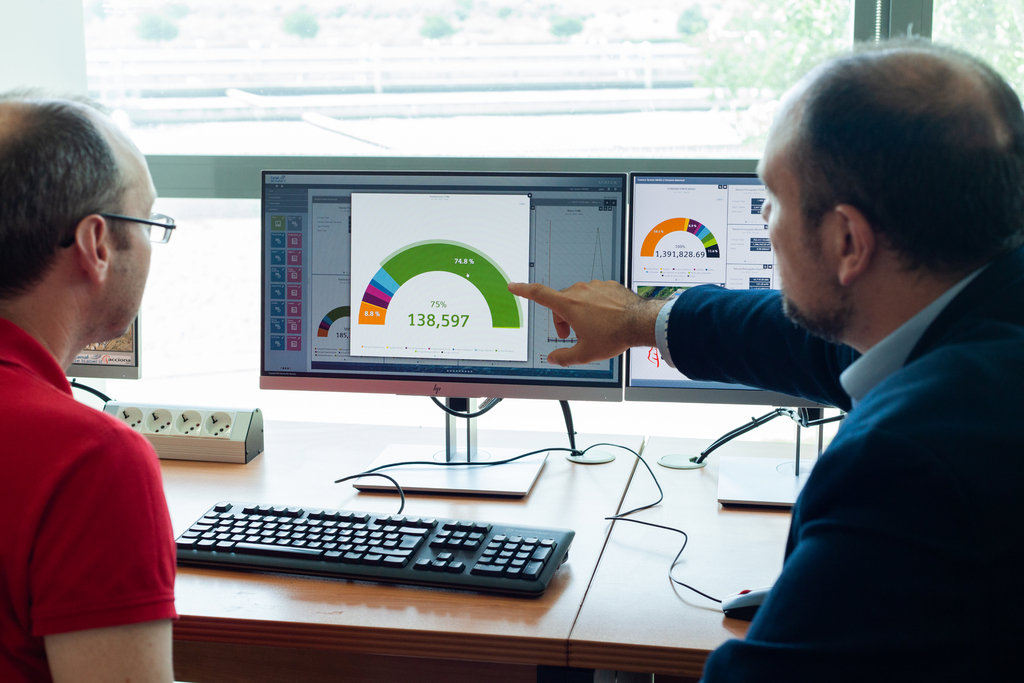 Image of people with a computer.